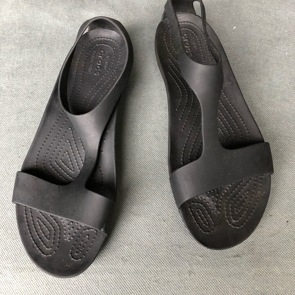 T strap slip on black Crocs